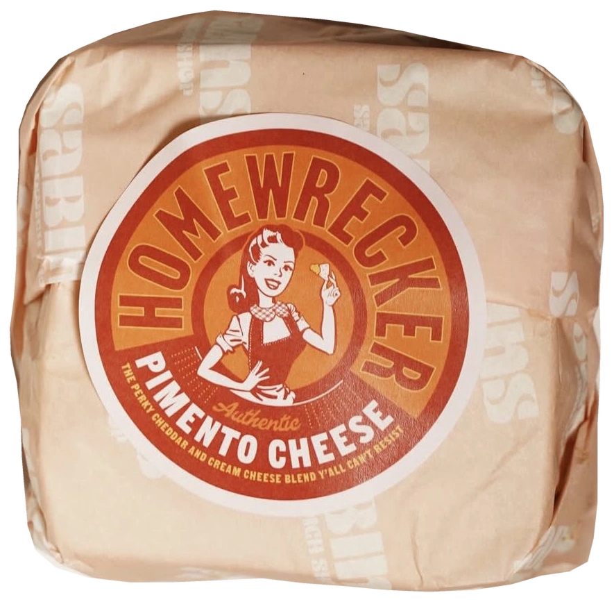 A sandwich wrapped in branded Sabins greaseproof paper with a Homewrecker sticker